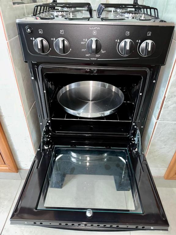 Kuchyň nebo kuchyňský kout v ubytování Apartamento con piscina, terraza y parking en las cercanías de Asunción
