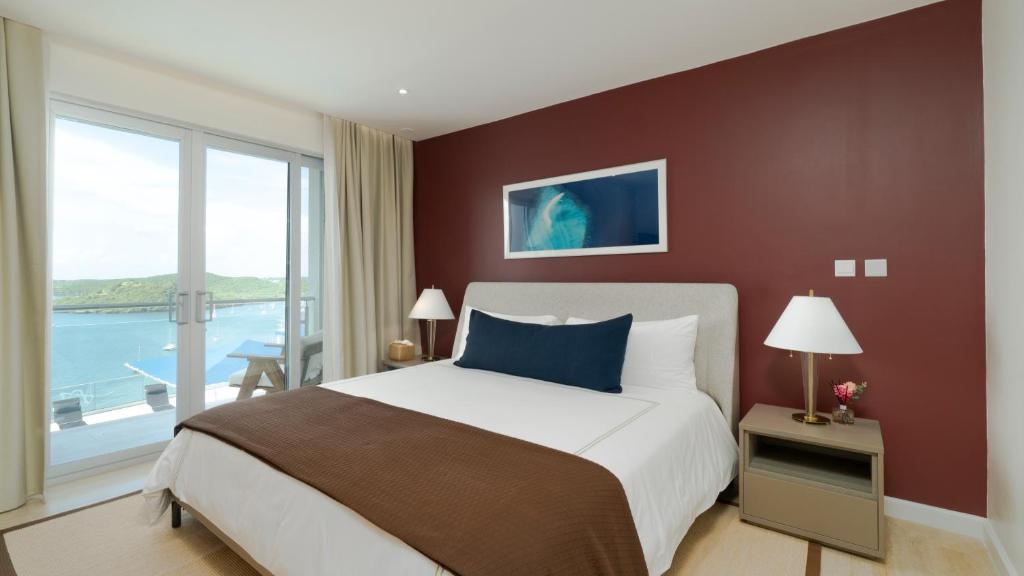 Postel nebo postele na pokoji v ubytování Amethyst Ocean View Condo