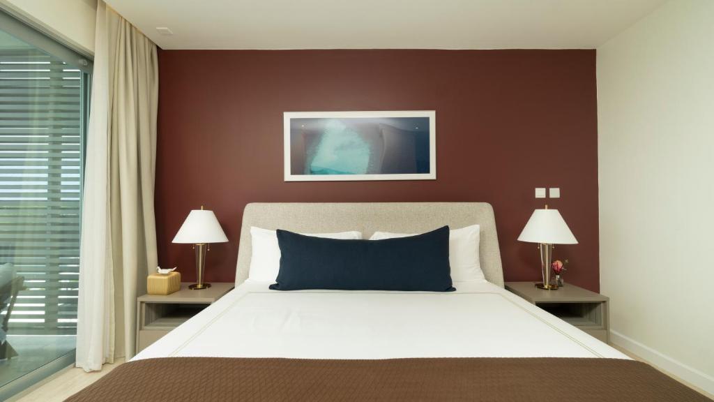 Postel nebo postele na pokoji v ubytování Amethyst Ocean View Condo