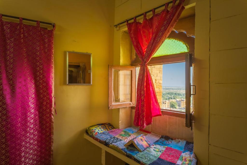 Postel nebo postele na pokoji v ubytování Sagar Guest House