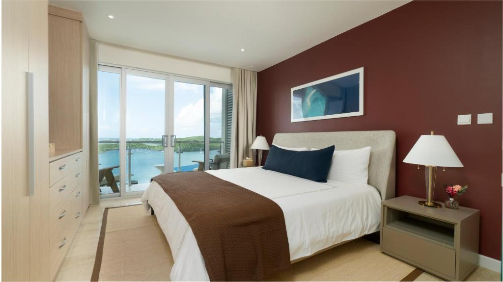 Postel nebo postele na pokoji v ubytování Amethyst Ocean View Condo