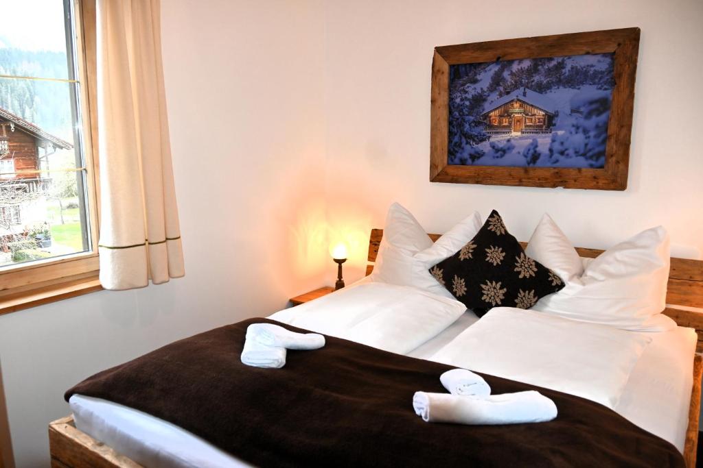 A bed or beds in a room at Haus Herz