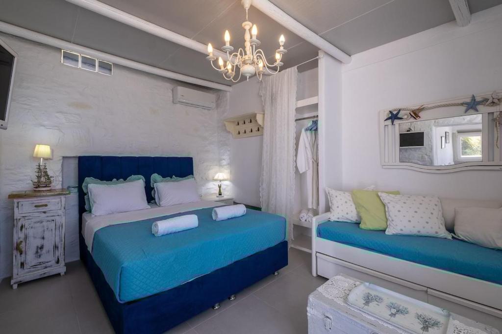 Posteľ alebo postele v izbe v ubytovaní Votsalaki new studio in Parikia Paros