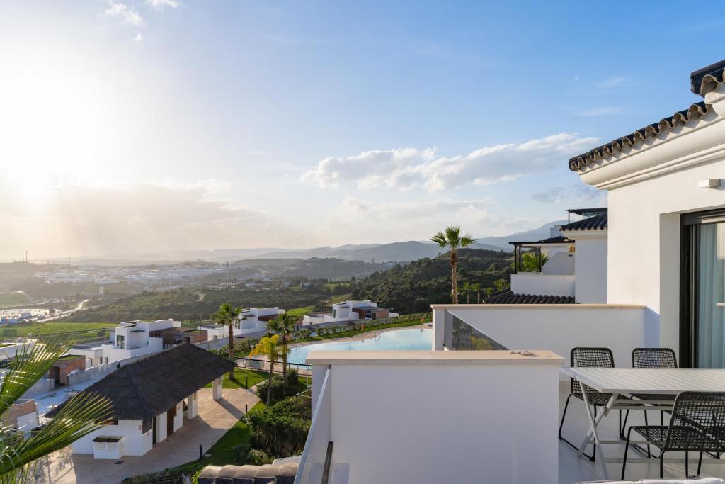 a view from the balcony of a villa at Luxury penthouse with ocean views in Estepona