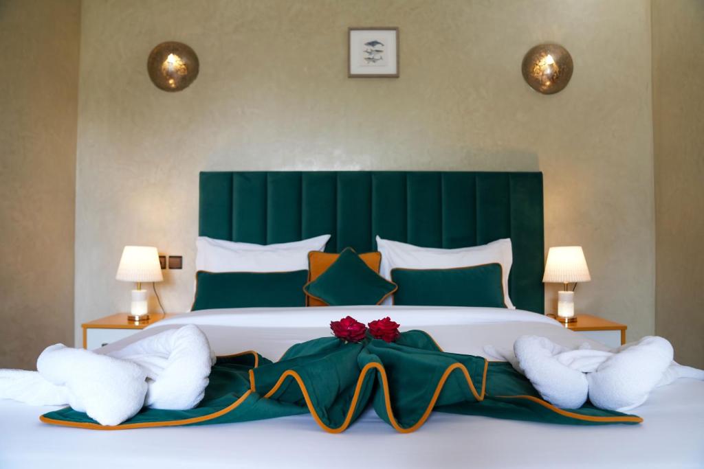 Postel nebo postele na pokoji v ubytování Janat Al Atlas Resort & Spa