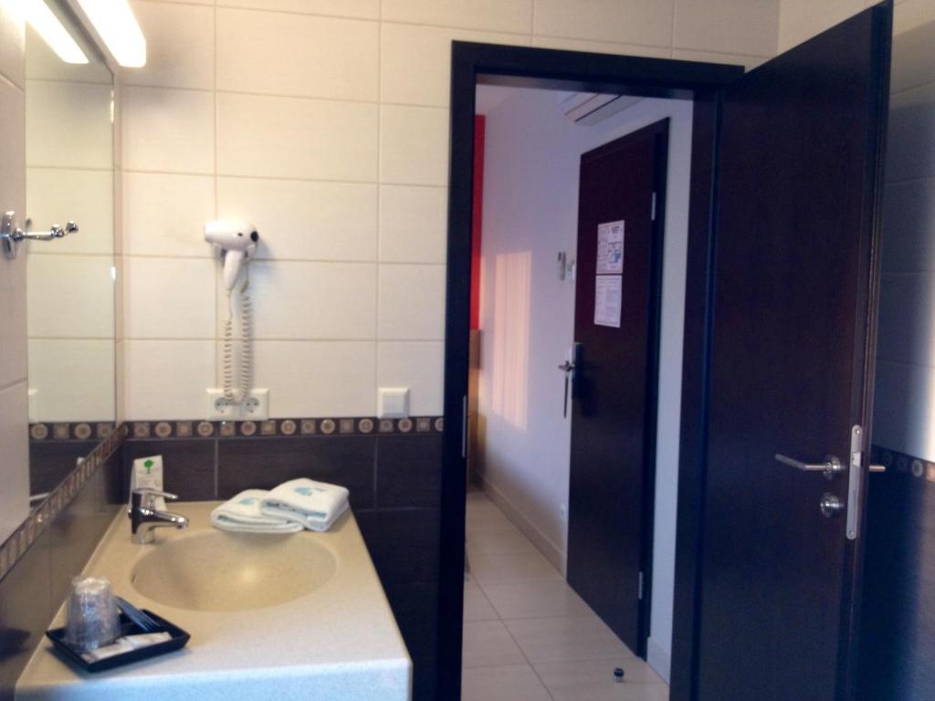 Koupelna v ubytování Hotel Pax