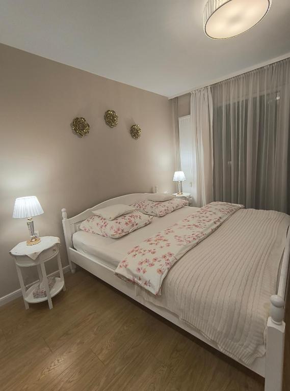Postel nebo postele na pokoji v ubytování Apartament MAX