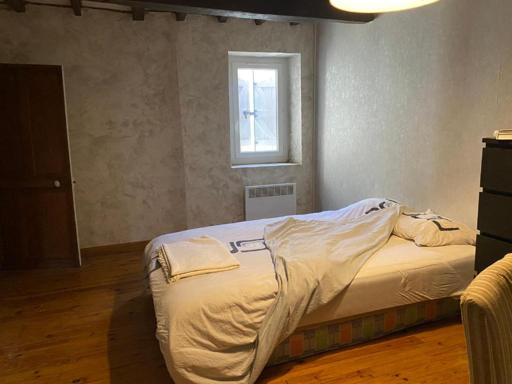 Postel nebo postele na pokoji v ubytování Chez Ashley