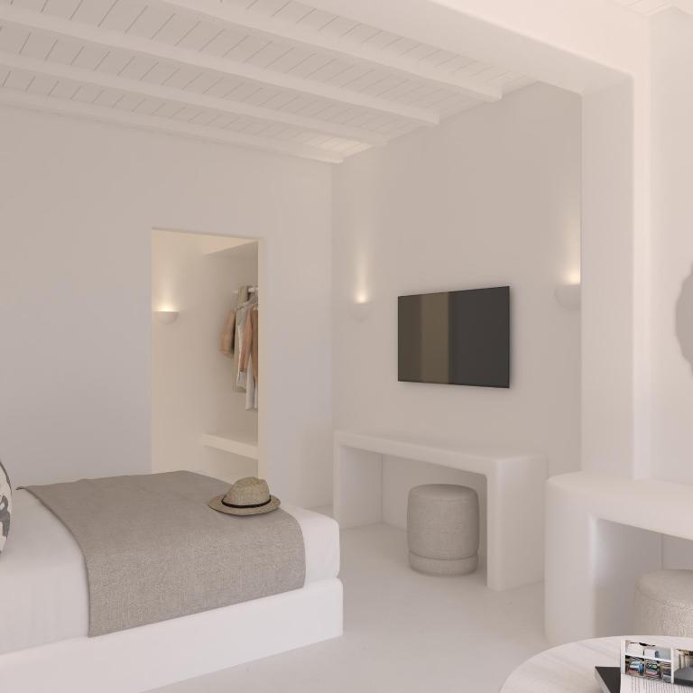 Posteľ alebo postele v izbe v ubytovaní Carpe Diem Santorini