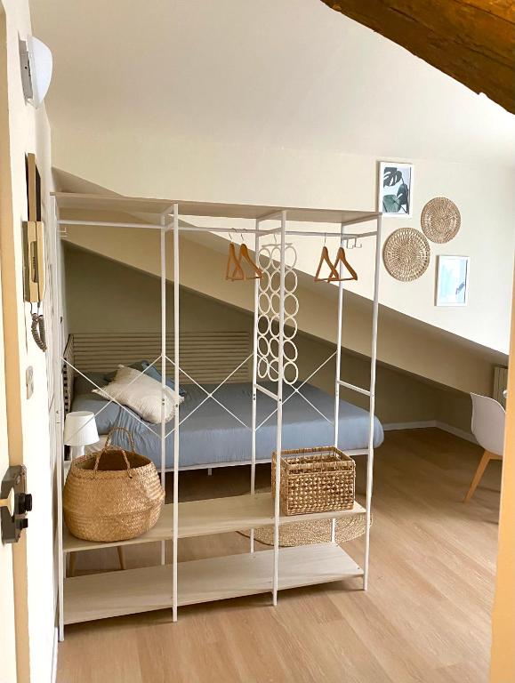 a white bunk bed in a room at Casa Nina in Turin