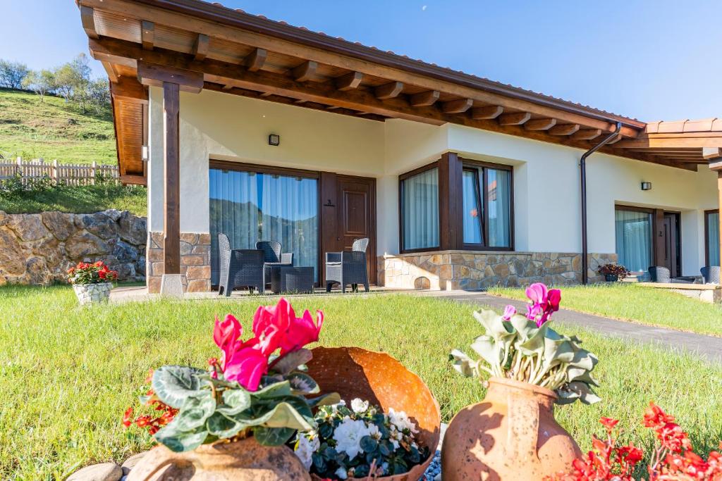 Κήπος έξω από το Apartamentos Cuetumerin