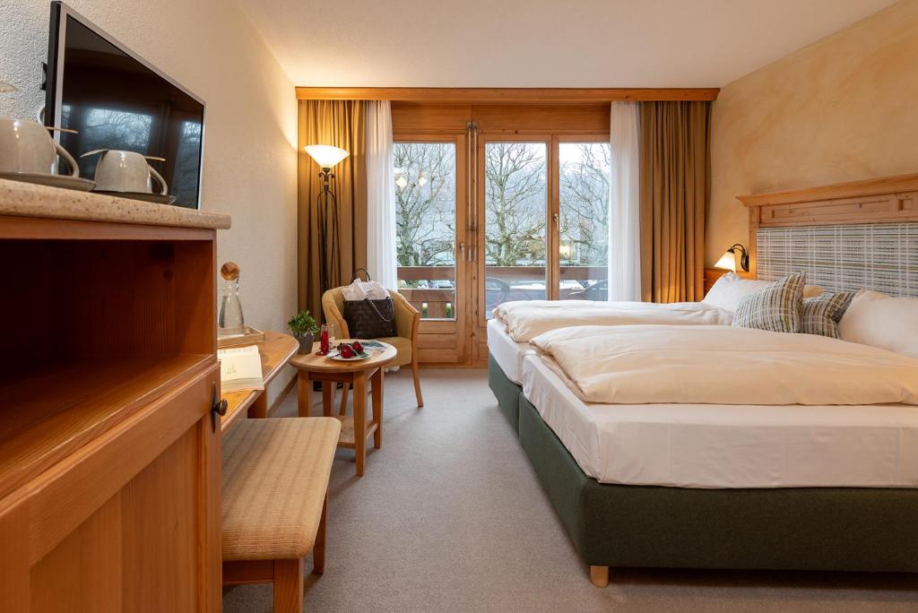 Postel nebo postele na pokoji v ubytování SALZANO Hotel - Spa - Restaurant