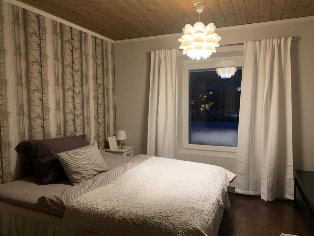 Katil atau katil-katil dalam bilik di Nydelig villa, med vanvittig utsikt!