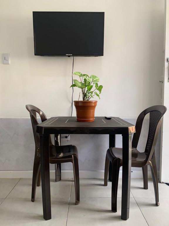 TV a/nebo společenská místnost v ubytování Hostal CasaBlanca, Laureles Estadio