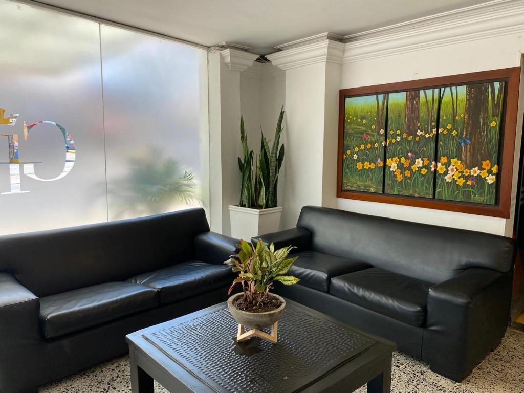 Гостиная зона в TAMA Hotel Granada Real Cali