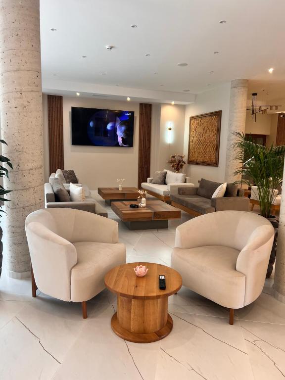 TV a/nebo společenská místnost v ubytování Designer apartment at Pirin Sense