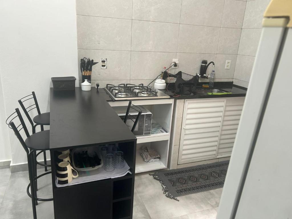 Nhà bếp/bếp nhỏ tại Loft em Copacabana