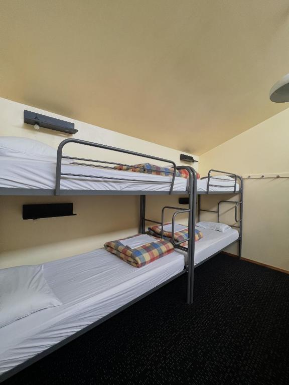 Letto o letti in una camera di On Top Backpackers