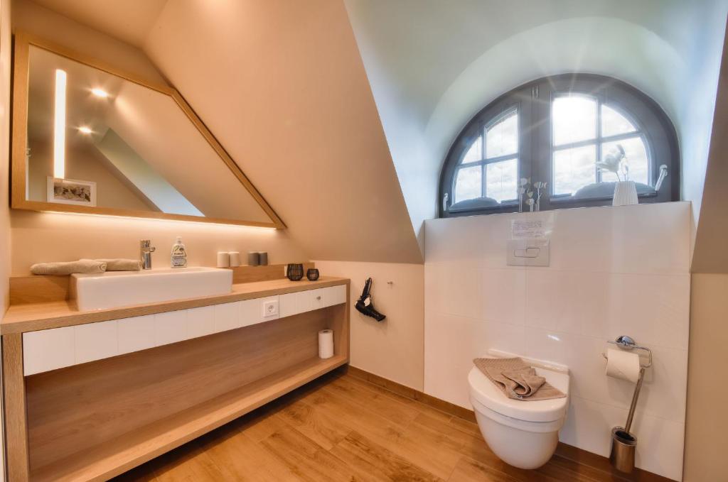 Koupelna v ubytování Ferienhaus Sehnsuchtsort 04 Feriendorf Klein Stresow Rügen by ruyastay