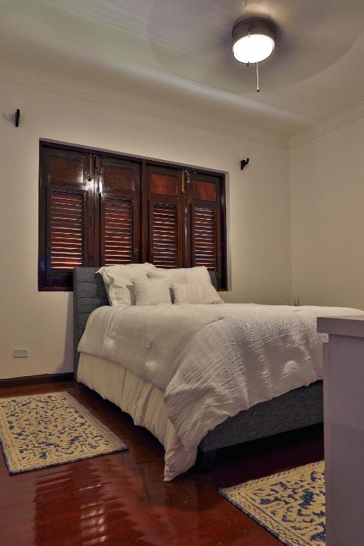 Postel nebo postele na pokoji v ubytování Ola Boutique Hotel