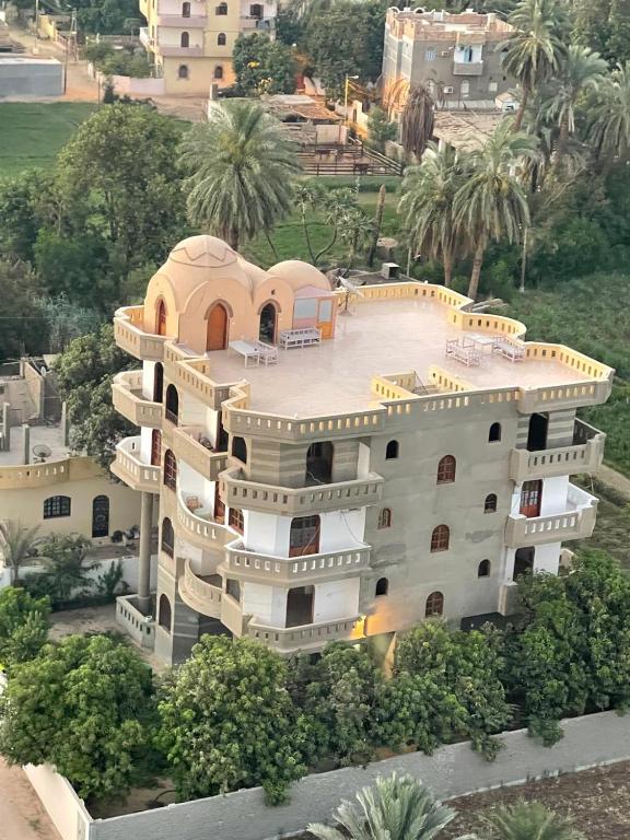 an aerial view of a large white building at Egypt Villa Garden in Luxor