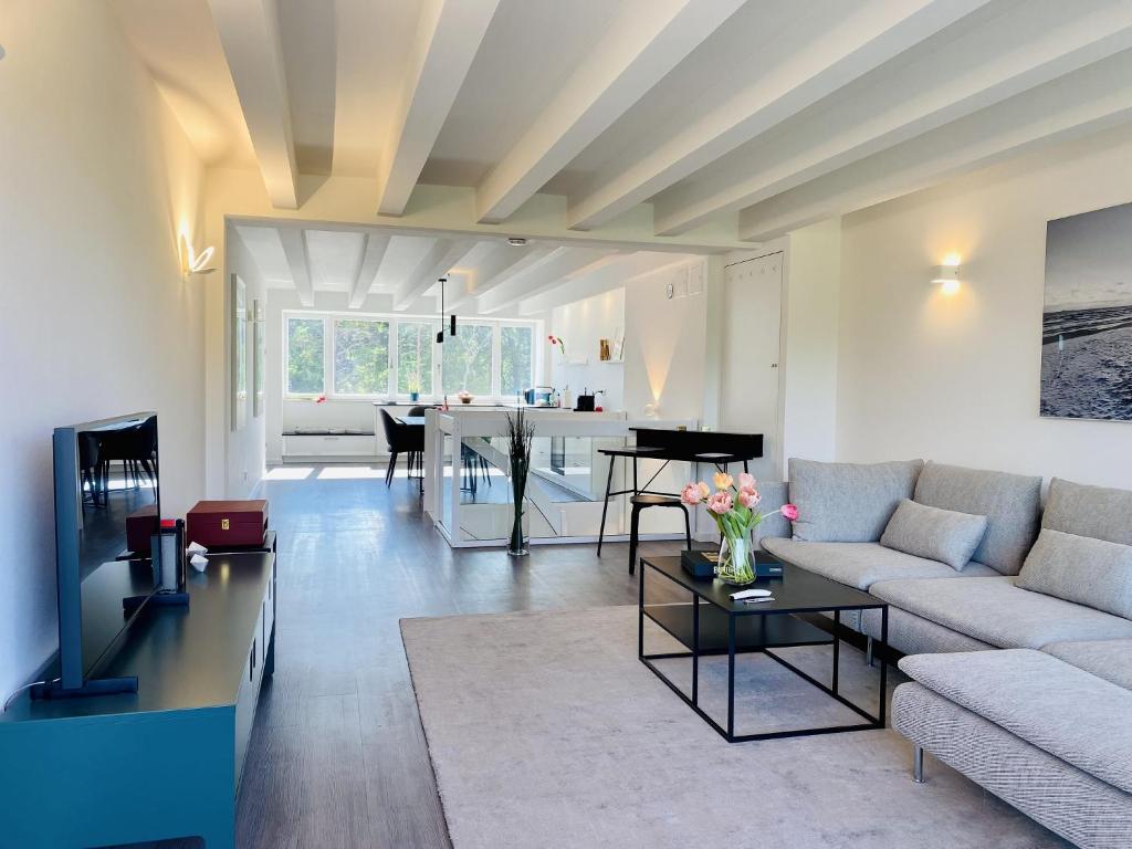 Χώρος καθιστικού στο Ferienwohnung FischerLoft im Haus Hiddensee Prora