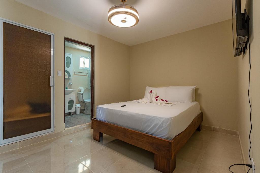 Letto o letti in una camera di Hotel Turístico Marian