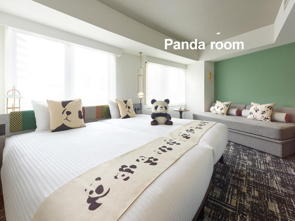 Postel nebo postele na pokoji v ubytování Mitsui Garden Hotel Ueno