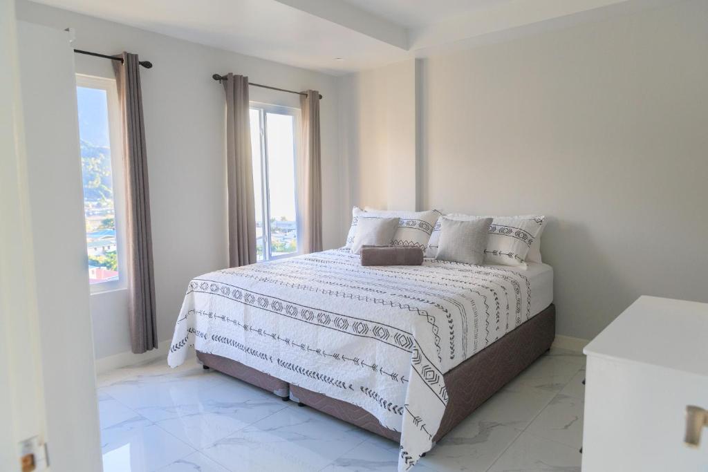 Postel nebo postele na pokoji v ubytování Caldera Villas