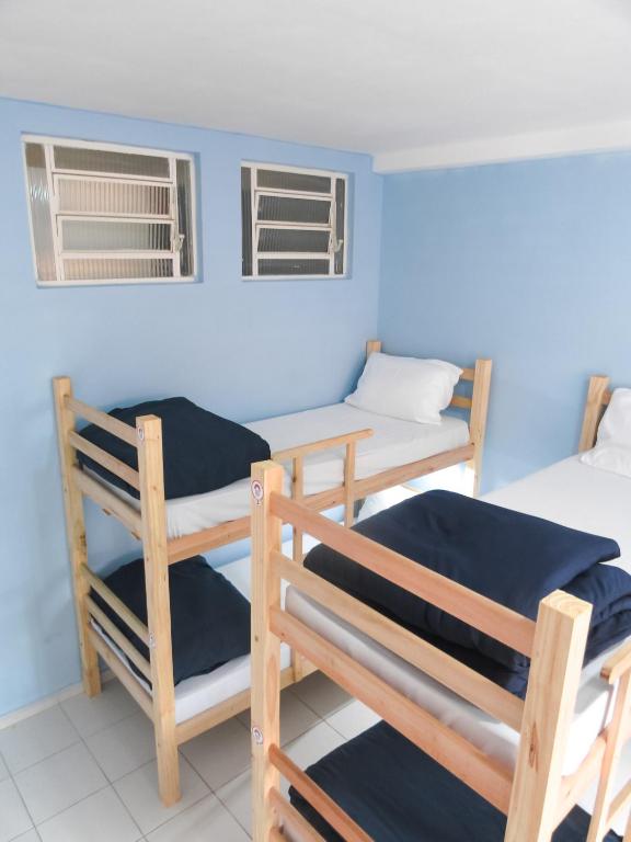 Postel nebo postele na pokoji v ubytování Hostel Kaizen Curitiba