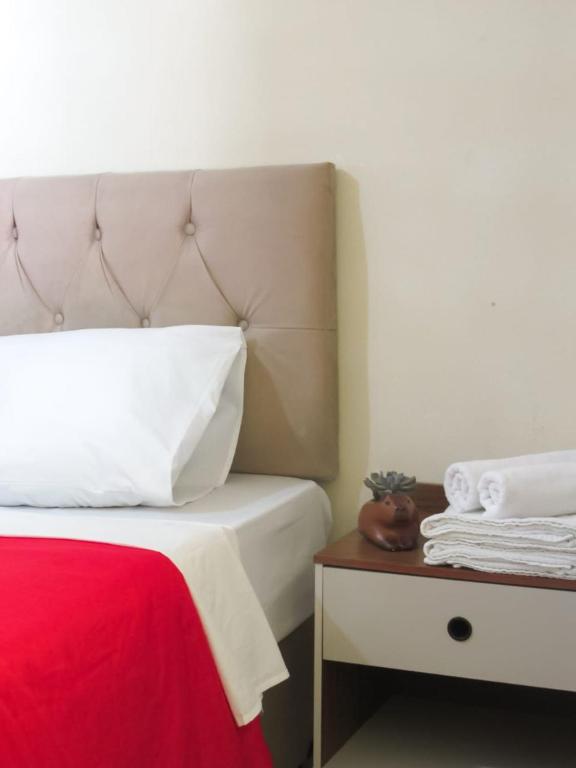 Postel nebo postele na pokoji v ubytování Hostel Kaizen Curitiba