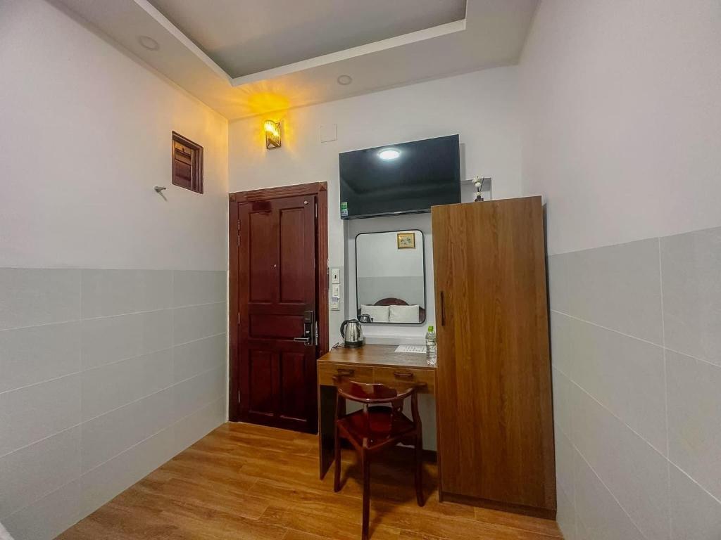 TV a/nebo společenská místnost v ubytování Motel Mỹ Vân