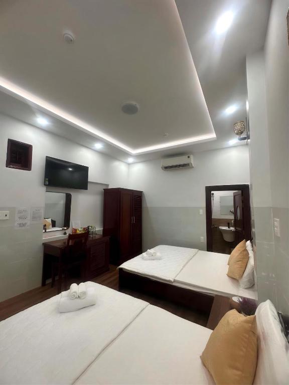 Postel nebo postele na pokoji v ubytování Motel Mỹ Vân