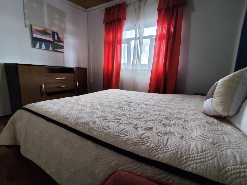 Postel nebo postele na pokoji v ubytování La Casa de Sandrita