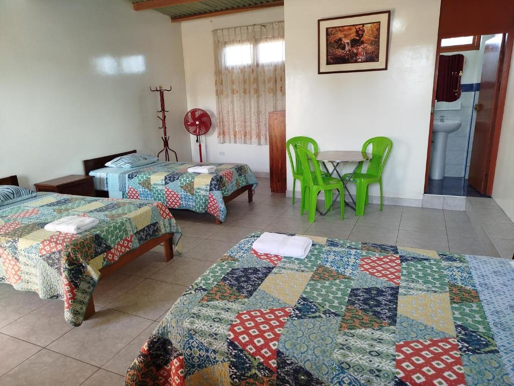 Postel nebo postele na pokoji v ubytování Nasca Trails B&B