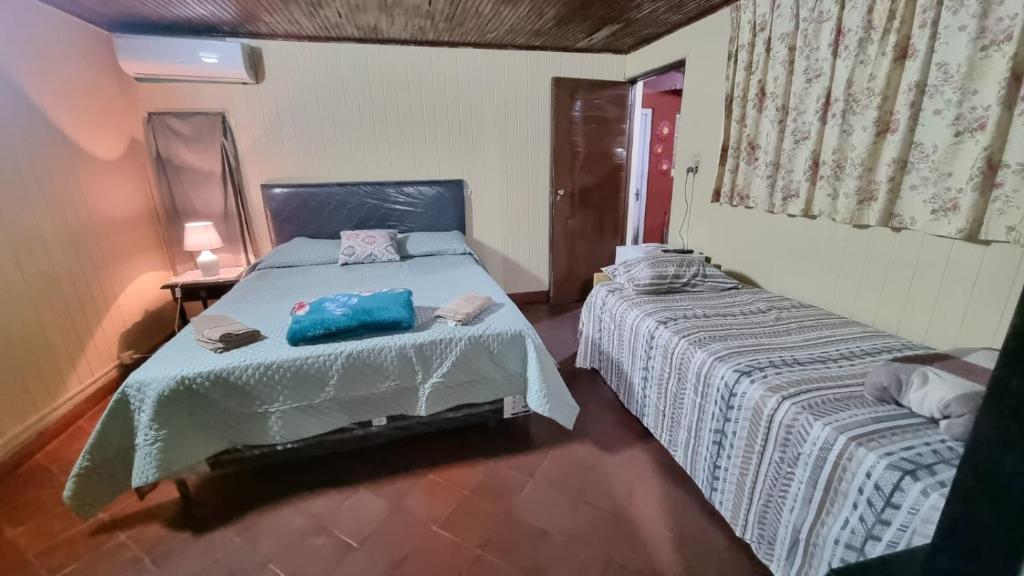 Postel nebo postele na pokoji v ubytování Mi Rinconcito