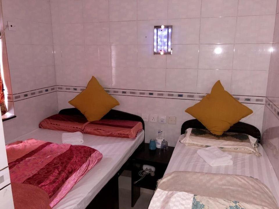 Rúm í herbergi á Philippine Hostel