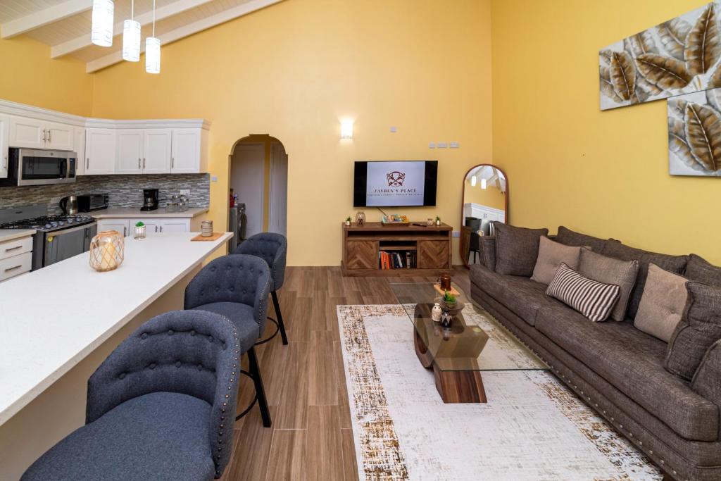 Kuchyň nebo kuchyňský kout v ubytování Zaydens Place