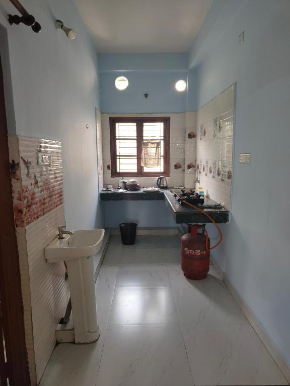 Koupelna v ubytování Tales of Guwahati IV 1BHK - AC extra 200
