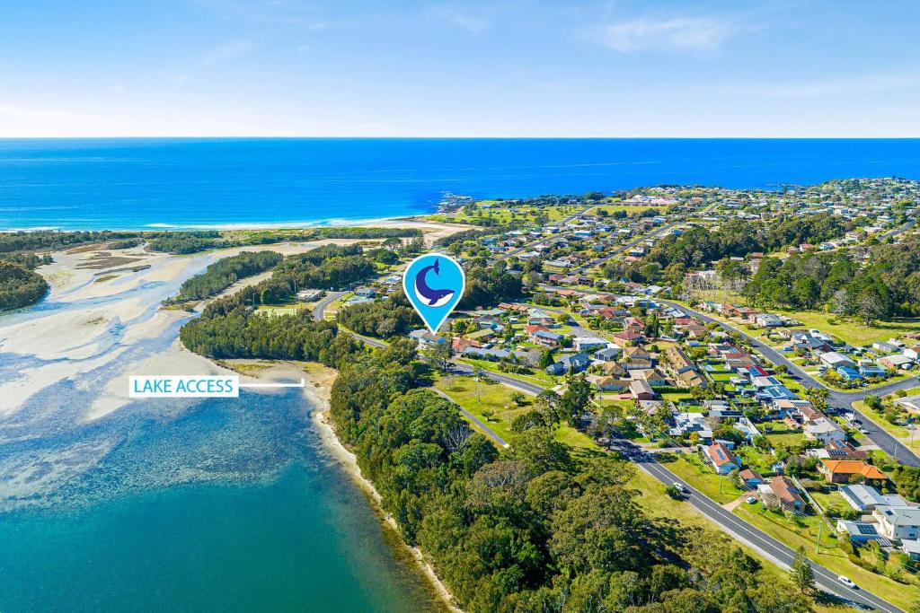 an aerial view of a town with a hot air balloon at 19 Mort Avenue - Dalmeny Lakeside in Dalmeny