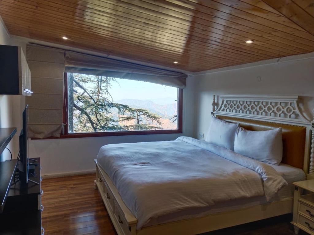 Postel nebo postele na pokoji v ubytování Holiday In Homestay