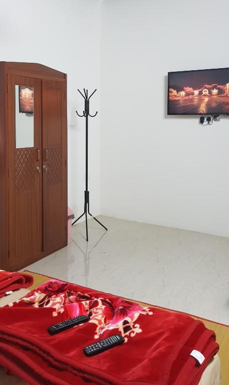 TV a/nebo společenská místnost v ubytování Tiwi Santorini