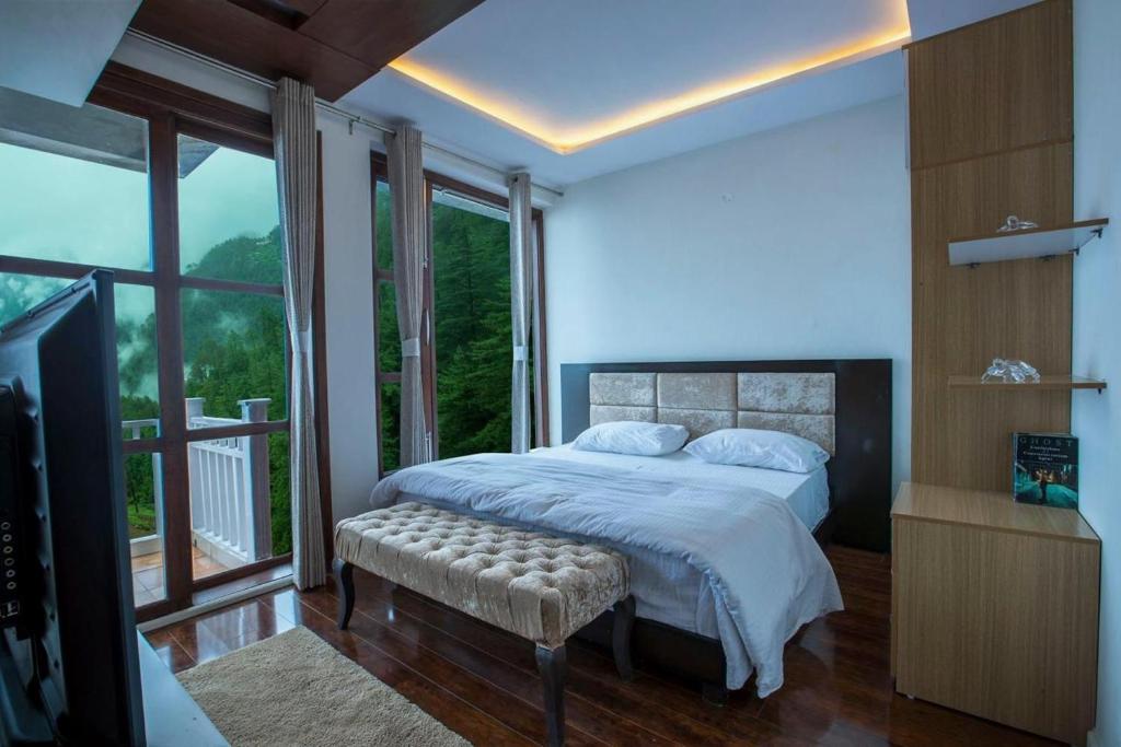 Postel nebo postele na pokoji v ubytování Holiday In Homestay