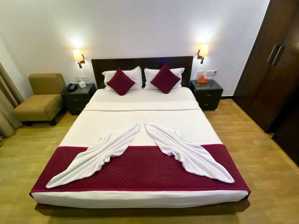 Postel nebo postele na pokoji v ubytování Sukhmantra Resort & Spa - Candolim Goa