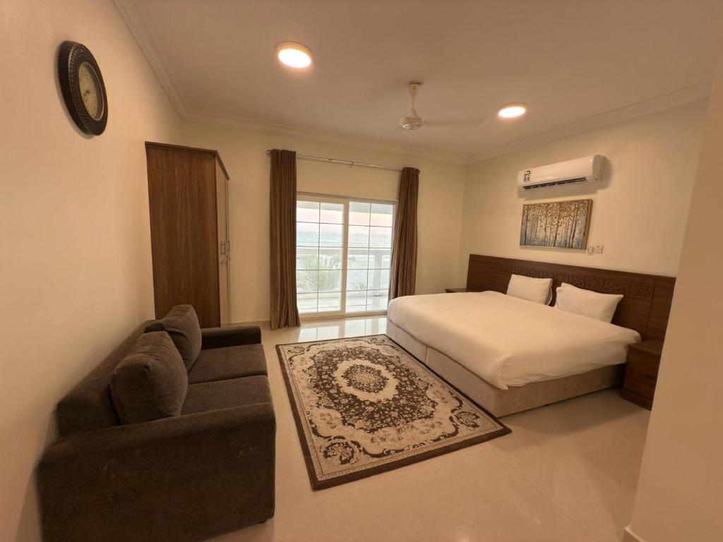 Postel nebo postele na pokoji v ubytování Salalah golden villa