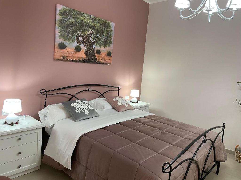 Postel nebo postele na pokoji v ubytování B&B Tregì