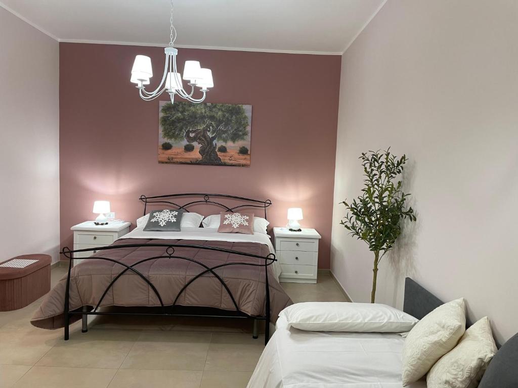 Postel nebo postele na pokoji v ubytování B&B Tregì