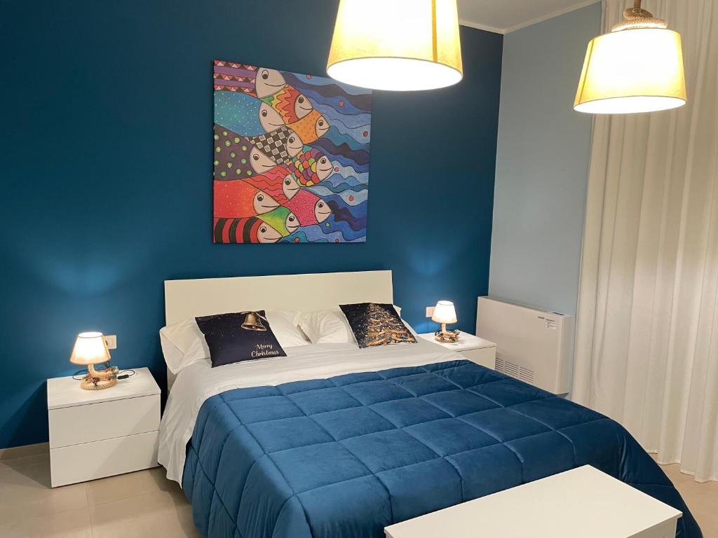 Postel nebo postele na pokoji v ubytování B&B Tregì