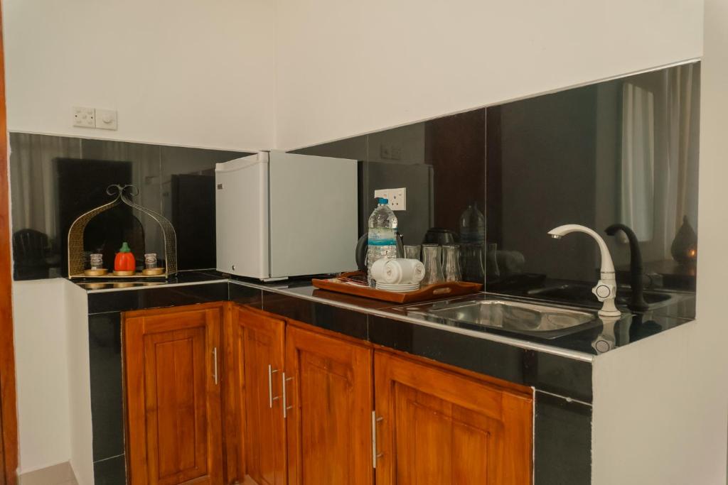 Cucina o angolo cottura di R2 Guest - HIKKADUWA