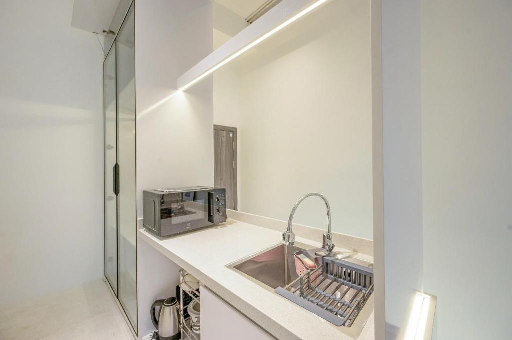 Kuchyň nebo kuchyňský kout v ubytování Q Hotel & Apartment Da Nang